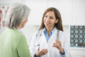 doctor giving a patient medication