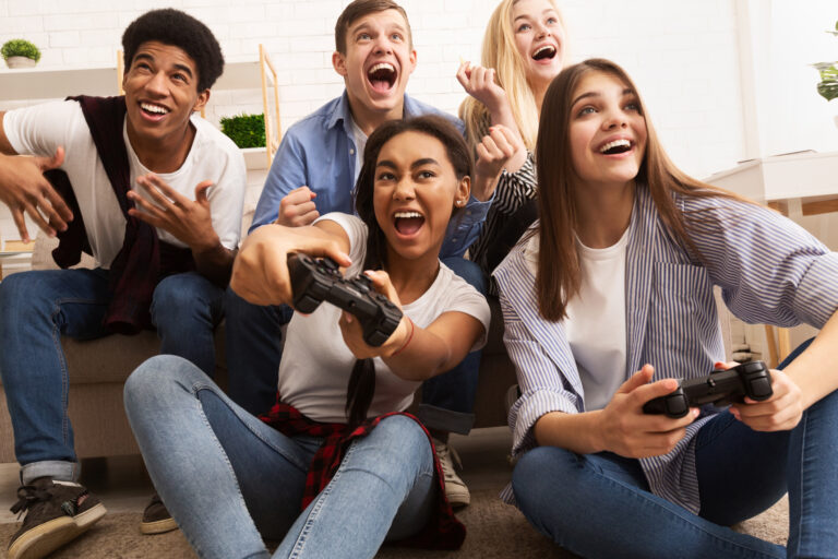 group playing video games gettyimages 1182435064
