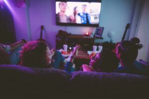 group of teens watching tv