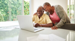 happy older couple retirement wealth invest 1200x664 163dd79