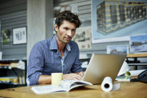 man 40s laptop concentrating gettyimages 481292775