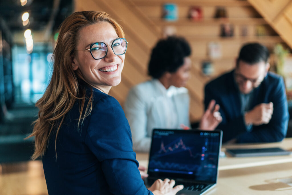 getty happy smiling person at laptop w glasses