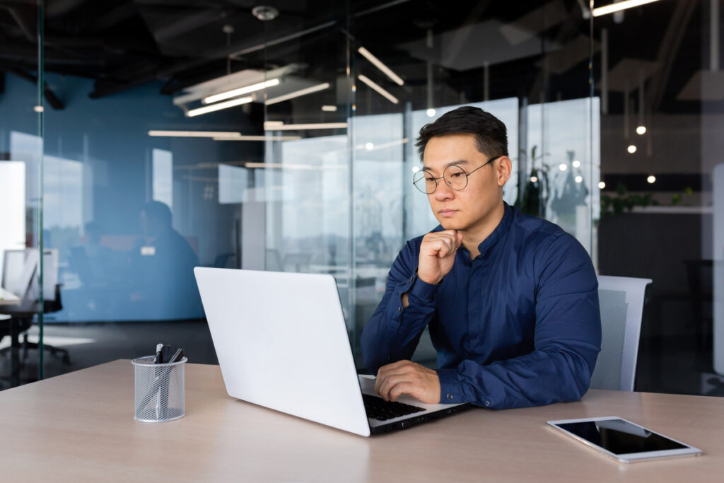 investor works on a laptop