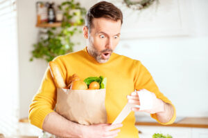 shopper is shocked at grocery receipt