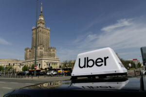 uber logo on top of car uber