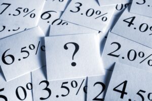 23 04 26 a pile of papers with percentages and one on top of the pile with a question mark mf dload