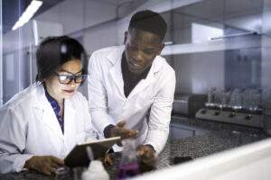 biotech pharma researchers talk lab