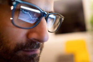 chart reflected on investor glasses