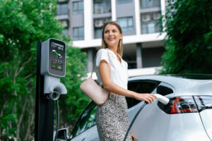 driver charging an ev