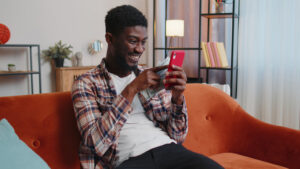 happy person looking at a phone