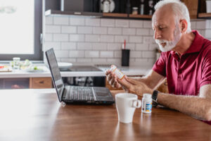 older man pills laptop