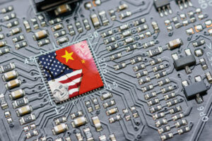 us and chinese flags superimposed on a semiconductor